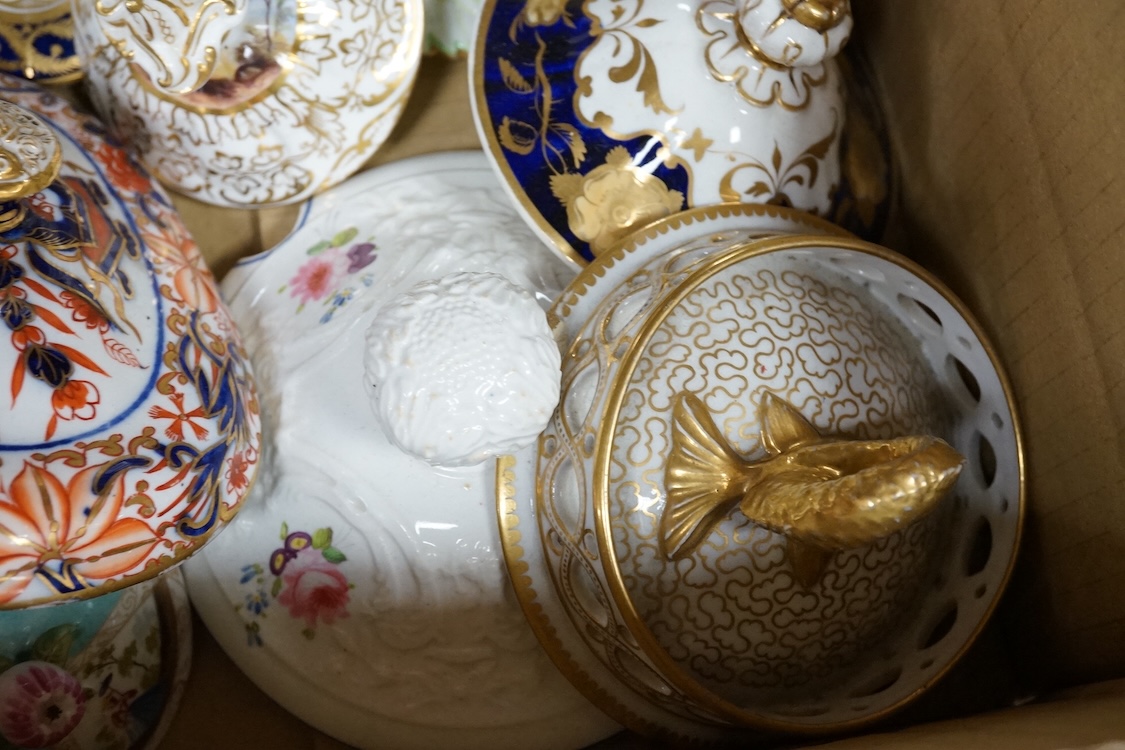 A collection of porcelain tureen and pot covers, largely 19th century